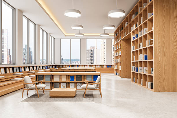 istock Modern library interior with wooden bookshelves and seating area. 3D Rendering 2212337670