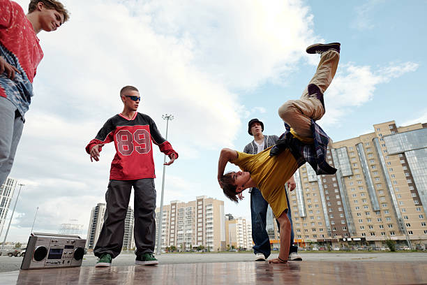 istock Performing Breakdancing Moves in Urban Environment 2212339386