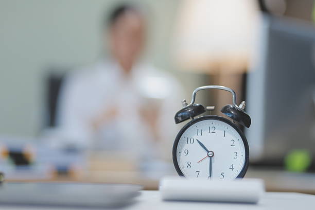 istock Young adorable Asian businesswoman working with work document during the night, working overtime at night. 2212339860
