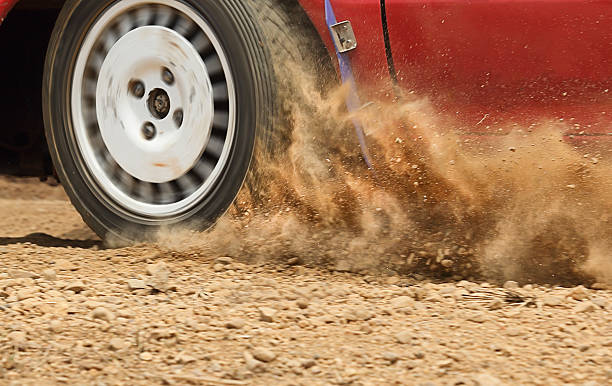 istock Rally car increase speed in dirt track. 2212344932