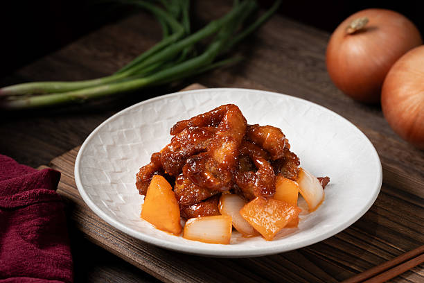 istock Chinese Cuisine - Peking Style Pork Chops 2212345796