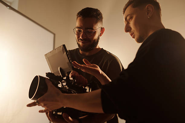 istock Filmmakers Reviewing Video 2212346838