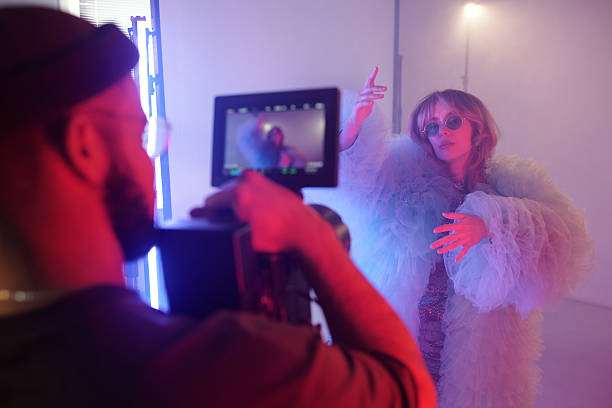 istock Backstage Process of Woman Performing For Camera 2212348493