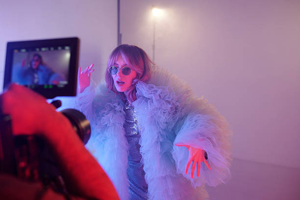 istock Young Woman Performing In Costume during Video Shoot 2212348802