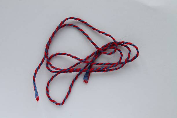 istock Colorful twisted cord lying on a white surface is ready for creative projects, crafting, and DIY activities in a bright and artistic setting 2212351705