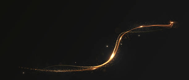 istock Golden sparkling light ring with shimmering particles and a bright flare effect. Festive Christmas and New Year background featuring an abstract glittery confetti frame with a magical glowing sparkle trail. 2212354941