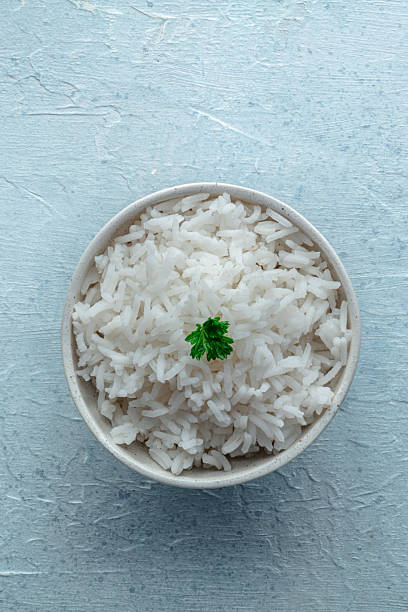 istock White rice, cooked. A bowl of boiled long grain rice, a simple side dish 2212361969