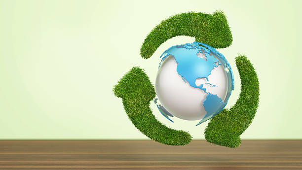 View a creative representation of sustainability featuring a globe wrapped in lush green arrows. This visual emphasizes eco-friendly practices and environmental awareness in design.
