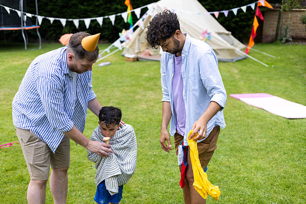 istock Parent Duties At Garden Party 2212364121