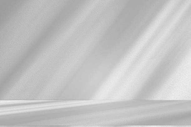 istock Wall interior background, studio and backdrops show products.with shadow from window color white . background for text insertion and presentation product 2212364575