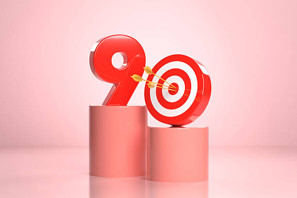 istock Number 9 And Bull's Eye Target On Pink Podium 2212365539