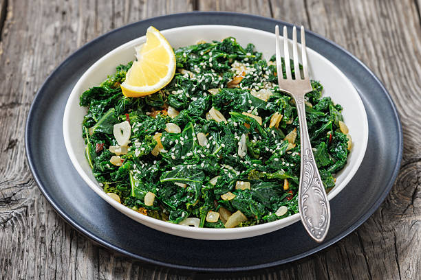 istock sauteed kale with garlic, onion, red pepper flakes 2212368657
