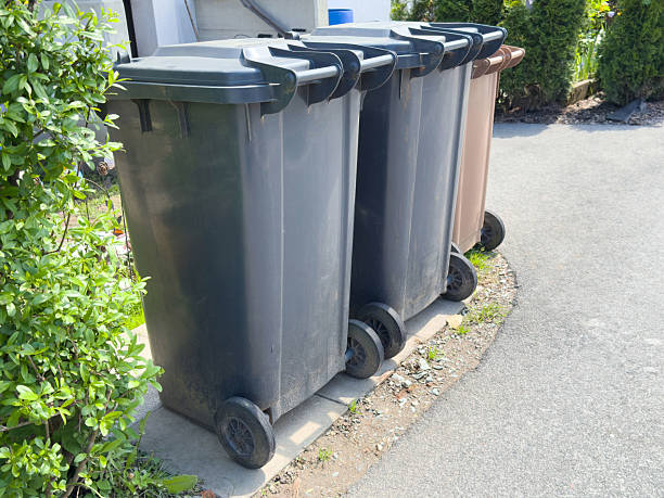 istock Outdoor trash bins in residential area 2212372020