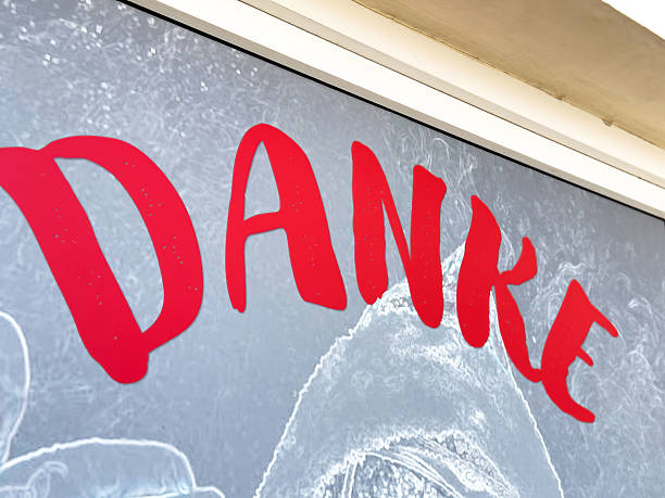 Danke sign in red letters on textured background