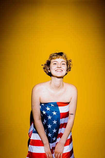 istock Joyful expression wrapped in the colors of pride and liberty 2212374172