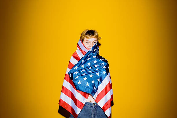 istock Capturing spirit and pride under a vibrant yellow backdrop 2212374644