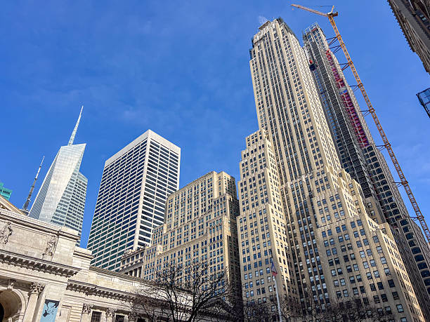 istock Majestic Skyscrapers Under Clear Blue Sky in Urban Cityscape 2212376852