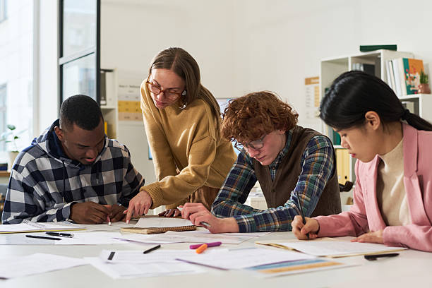 istock Group of Diverse People Studying Foreign Languages in Classroom 2212378132