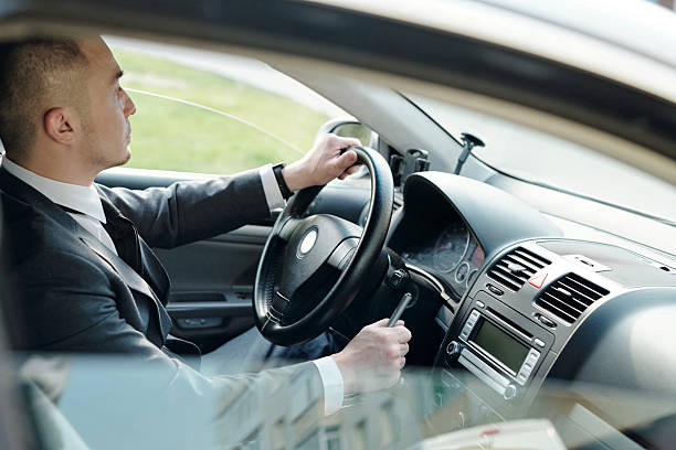 istock Disabled man sitting in the car and driving home 2212378428
