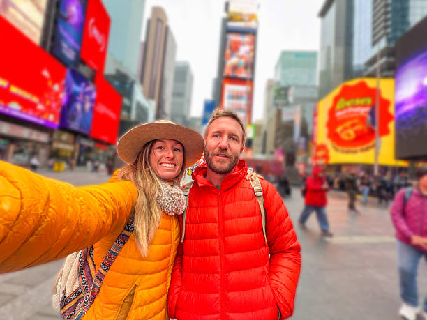 istock Tourists Taking a Selfie in Times Square 2212383253