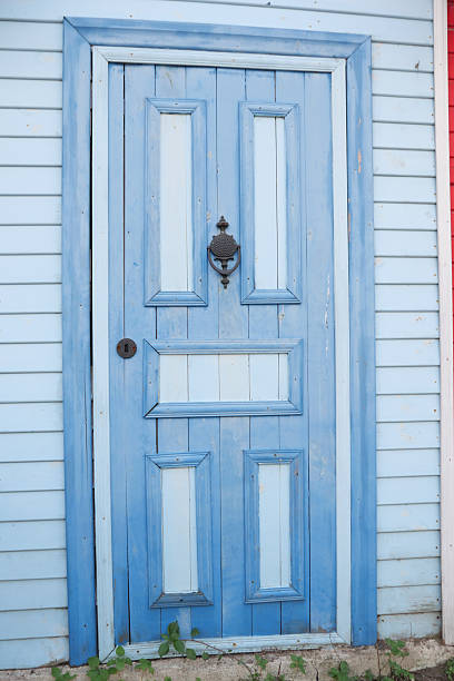 istock A Charming Blue Wooden Door Featuring an Elegant and Unique Design 2212385351