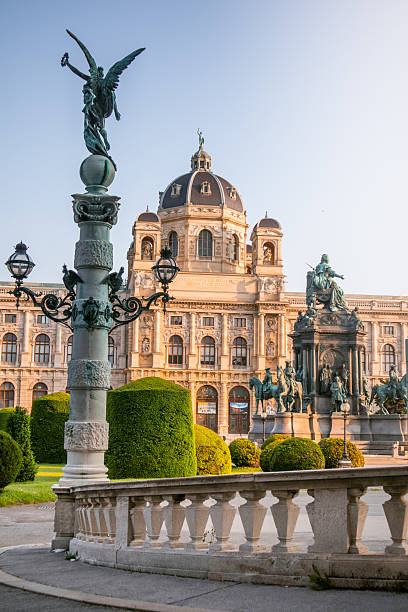 Vertical photograph Maria-Theresien-Platz square in Vienna, Austria during sunrise. Ideal for travel brochure, magazine cover, poster.