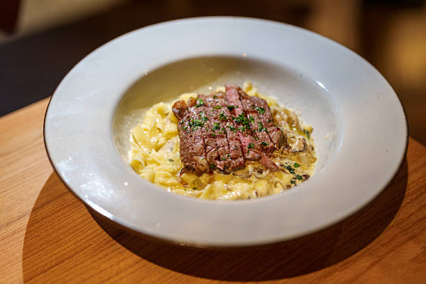 Creamy Fettuccine Pasta with Grilled Beef Steak