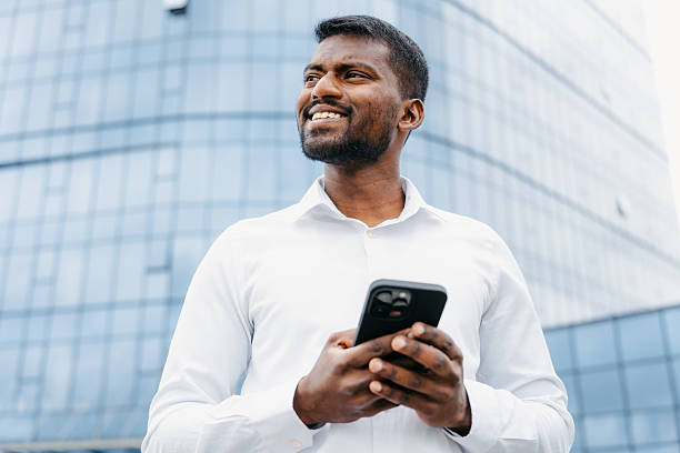 istock A man uses a mobile phone 2212394191