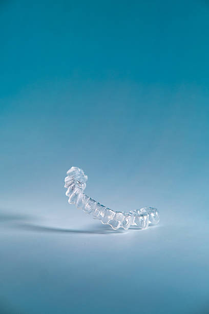 Invisible aligners for dental correction in the air.