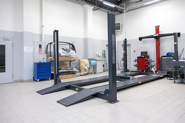 istock Car lift during maintenance 2212398503