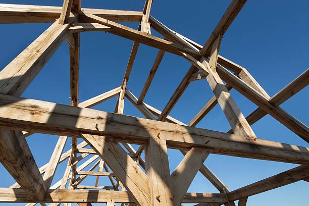 istock Skeleton of oak wood. Timber frame construction. Building a new house. 2212399593