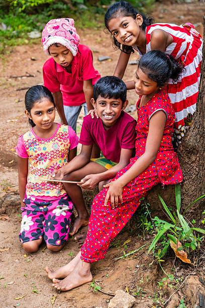 istock Sri Lankan teenagers using a digital tablet 2212399699