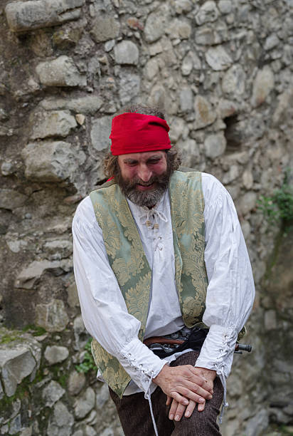 Taggia, Italy - February 23, 2025: Close-up of participant the historical reenactment in the historic city of Taggia, Liguria region of Italy