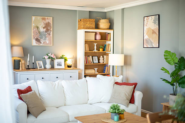 istock Modern living room interior with white sofa and bookcase 2212402909