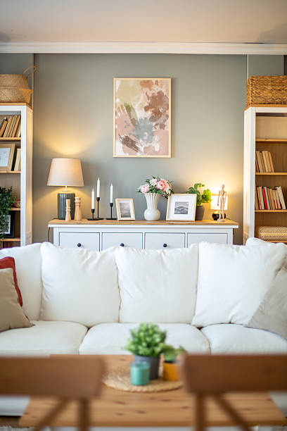 istock Modern living room interior design with white sofa and pastel decor 2212403023