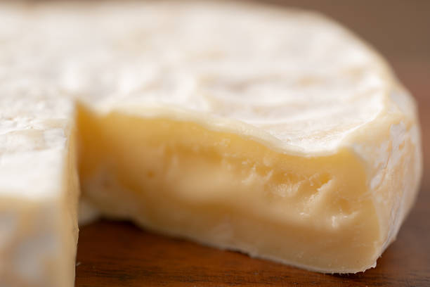 istock Close-up of sliced Camembert cheese 2212403978
