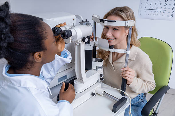 istock Young woman having a vision exam at the optometrist 2212405110