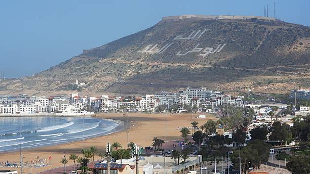 Landscape of the beach and kasbah of Oufella, Agadir, Morocco Landscape of the beach and kasbah of Oufella, Agadir - Morocco sunset agadir marocco stock pictures, royalty-free photos & images