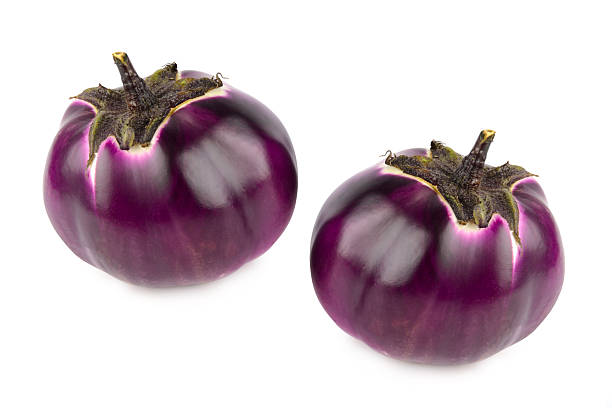 istock Eggplants or aubergine vegetables isolated on white background. 2212408155