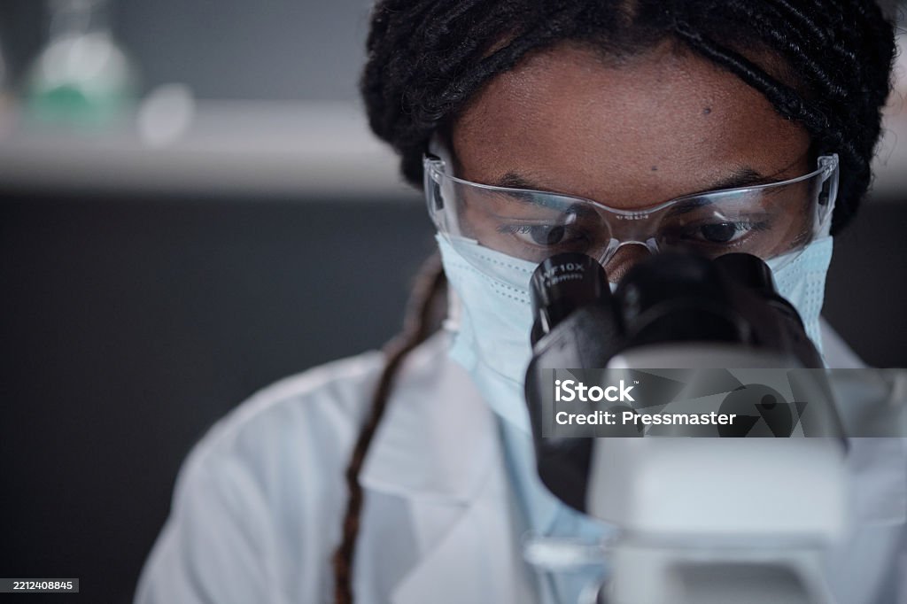 Sampling African Americans African American Scientist Observing Sample Through Microscope Stock ...