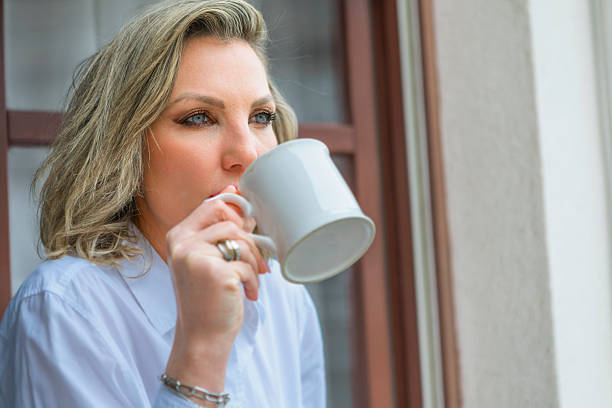 istock Morning coffee by the window 2212410074