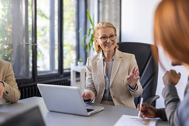 istock Focused Professionals Engaging in a Business Discussion 2212410959