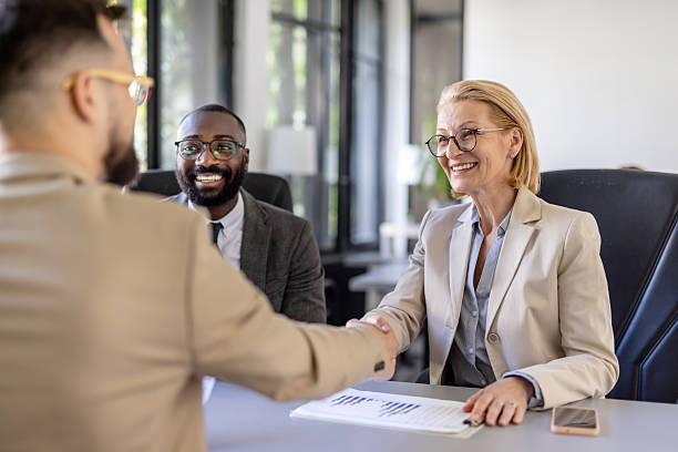 istock Professional Handshake During Business Meeting in Office Space 2212411020