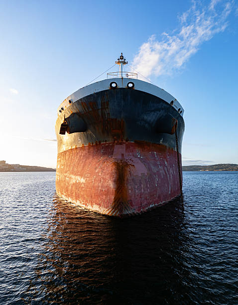 Draft mark numbers on red and black metal hull surface of oil tanker ship after Renovation work in vertical frame