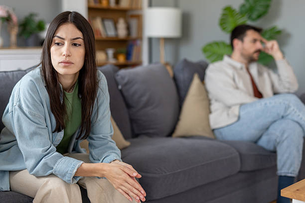 istock Concerned Woman Deep in Thought During a Disagreement Scene 2212411457