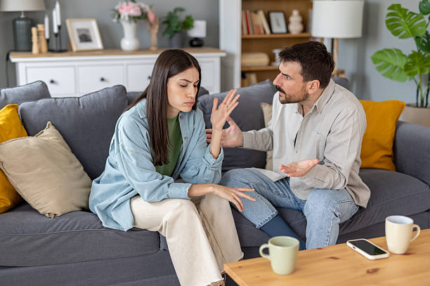 istock Couple Struggling to Communicate in Comfortable Setting 2212411502