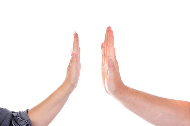 istock Male and female palms clap each other. High five. 2212412695