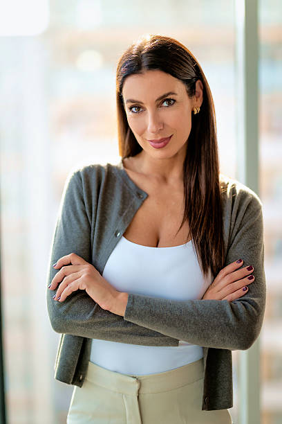 Mid aged businesswoman in modern office