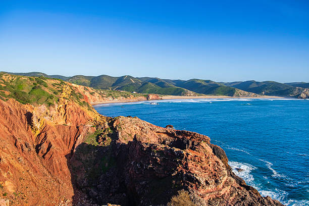 istock Rocky coastline in the west Algarve (Portugal) 2212413868