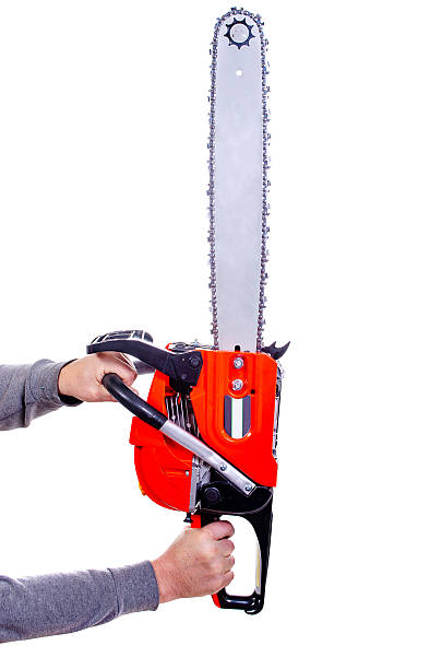 Orange chainsaw isolated